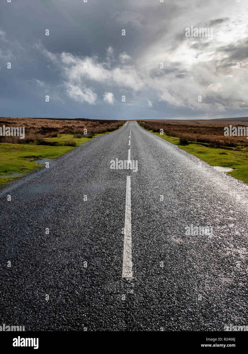 An empty, open road in wet weather in Exmoor National Park Devon UK Stock Photo