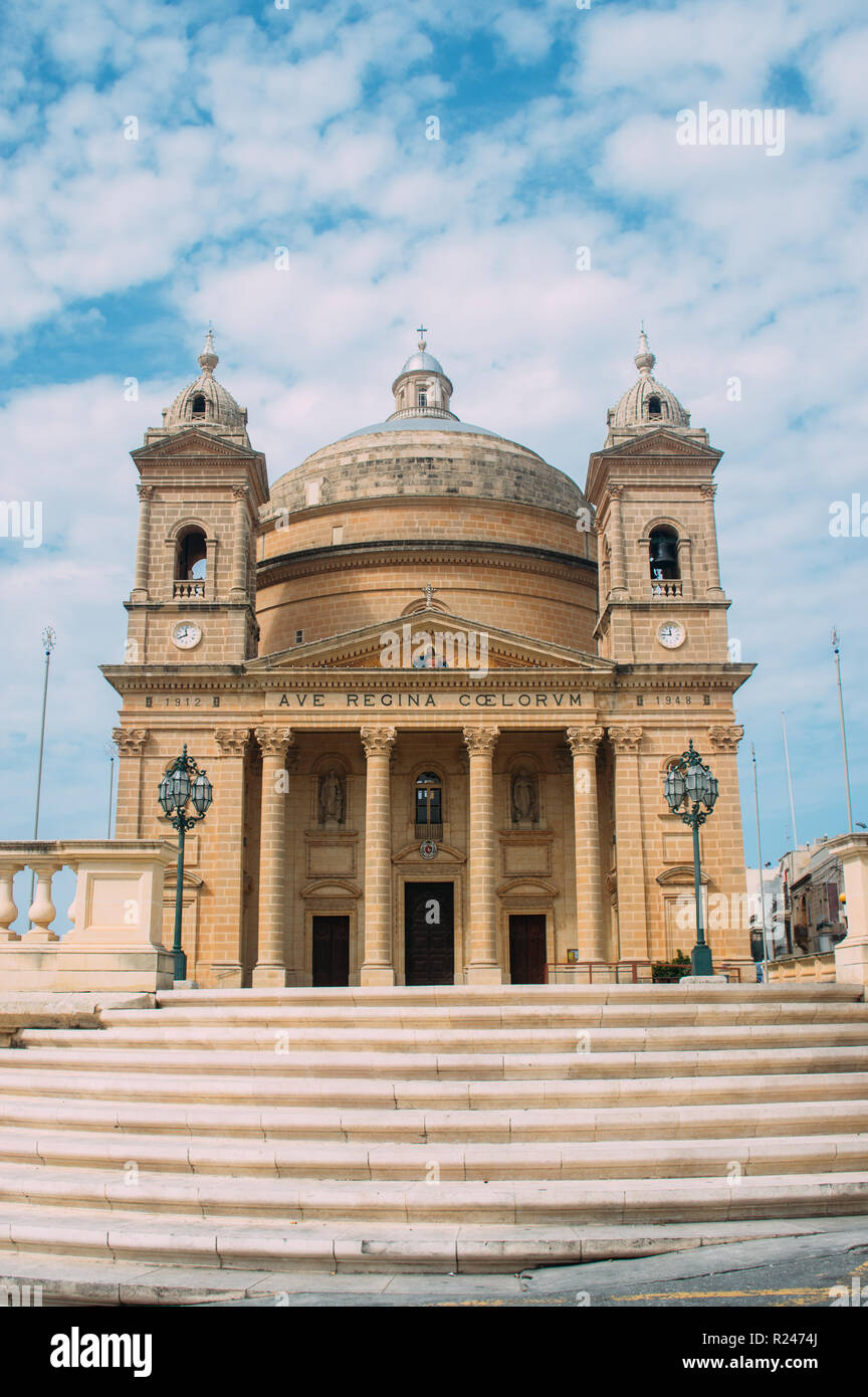 View to Parish Church of the Assumption of the Blessed Virgin Mary into Heaven in Mgarr, Malta Stock Photo