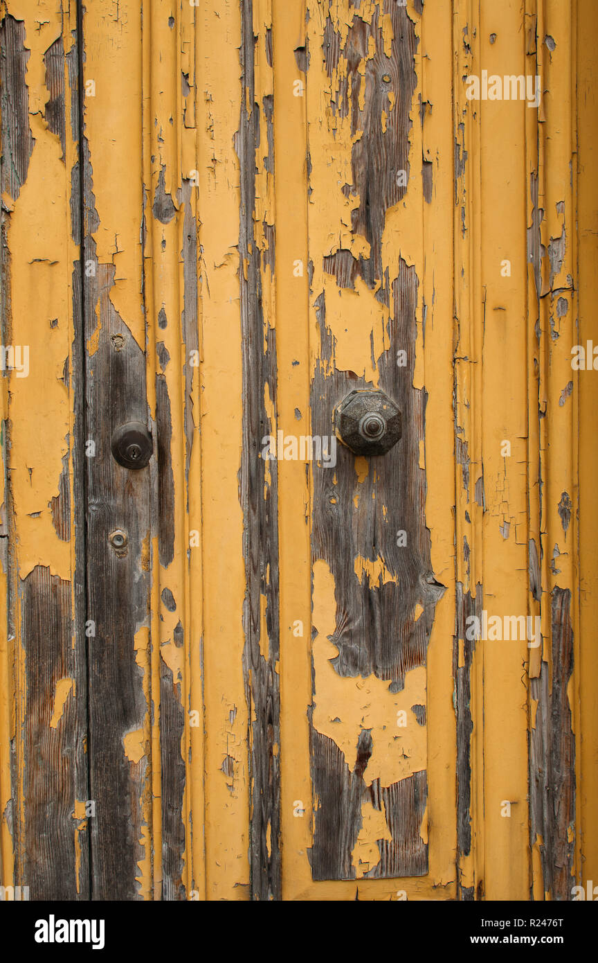 Yellow maltese door with paint, Malta Stock Photo