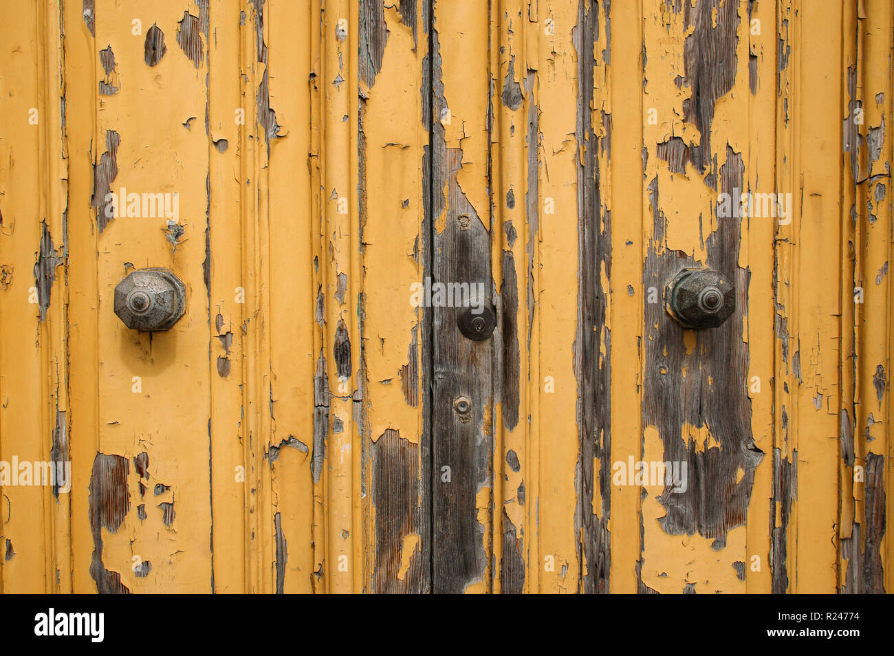 Yellow maltese door with paint, Malta Stock Photo