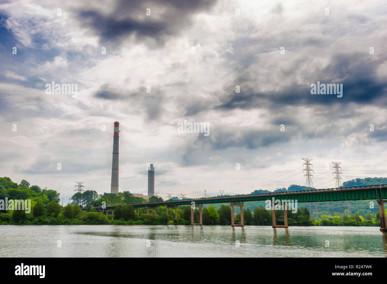 Bull Run Fossil Plant a coal-fired electric generating station in Oak Ridge, Tennessee, seen from the opposite shore along a walking path that follows Stock Photo