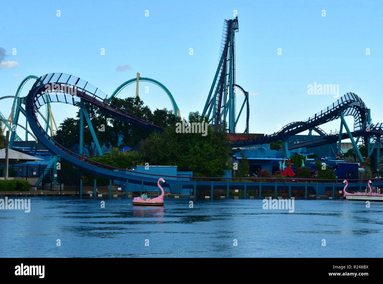 Orlando, Florida. October 05 , 2018. Panoramic view of Colorful Rollercoasters and Flamingo Boat at Seaworld Theme Park in International Drive Area. Stock Photo