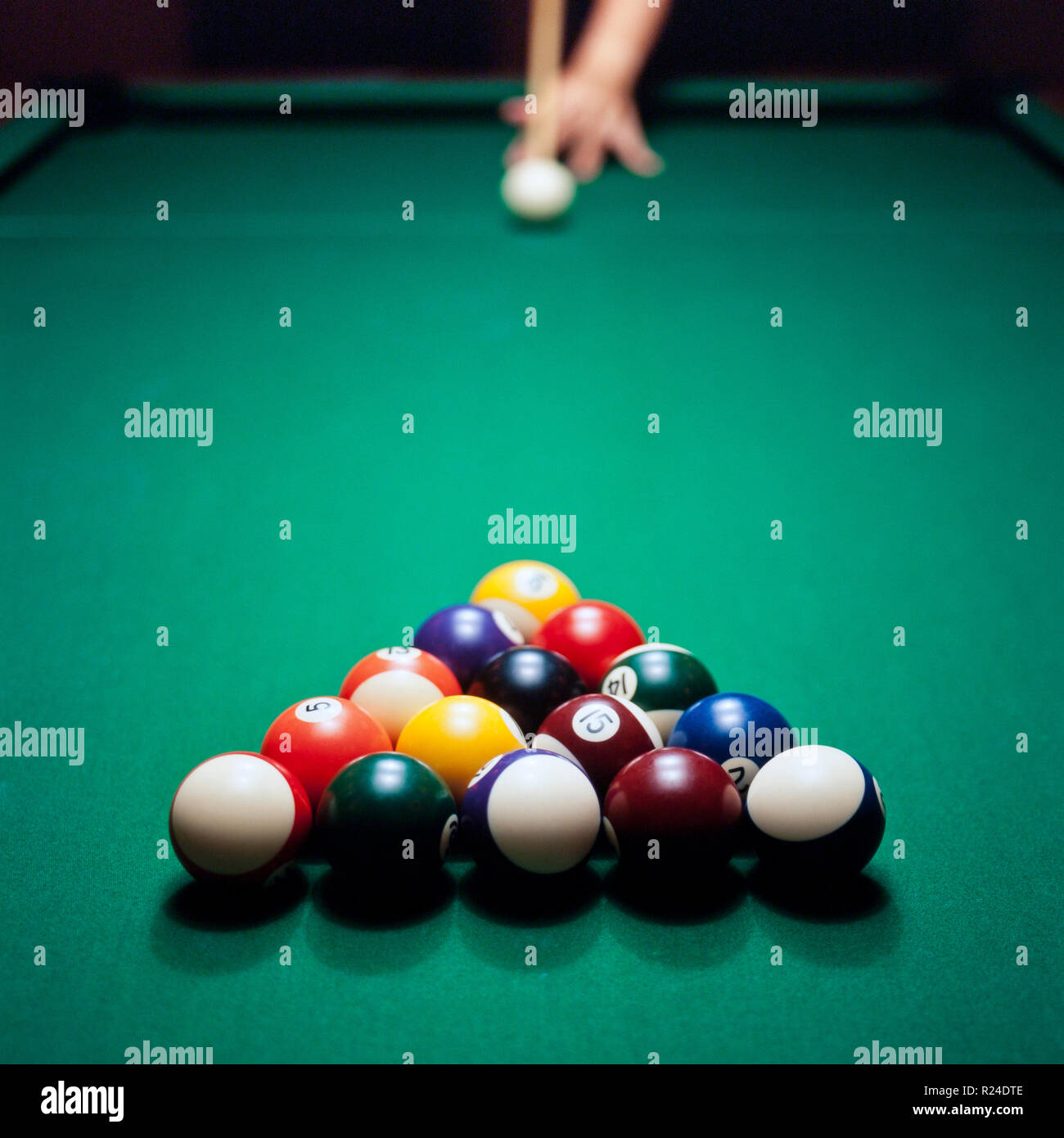 Adult male playing pool, snooker or billiard Stock Photo