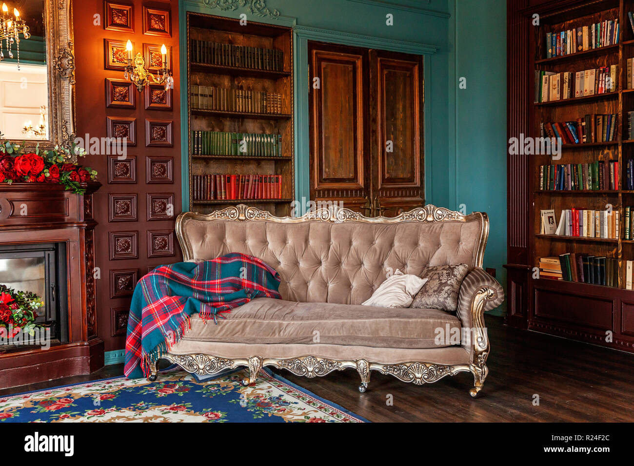 Luxury classic interior of home library. Sitting room with bookshelf