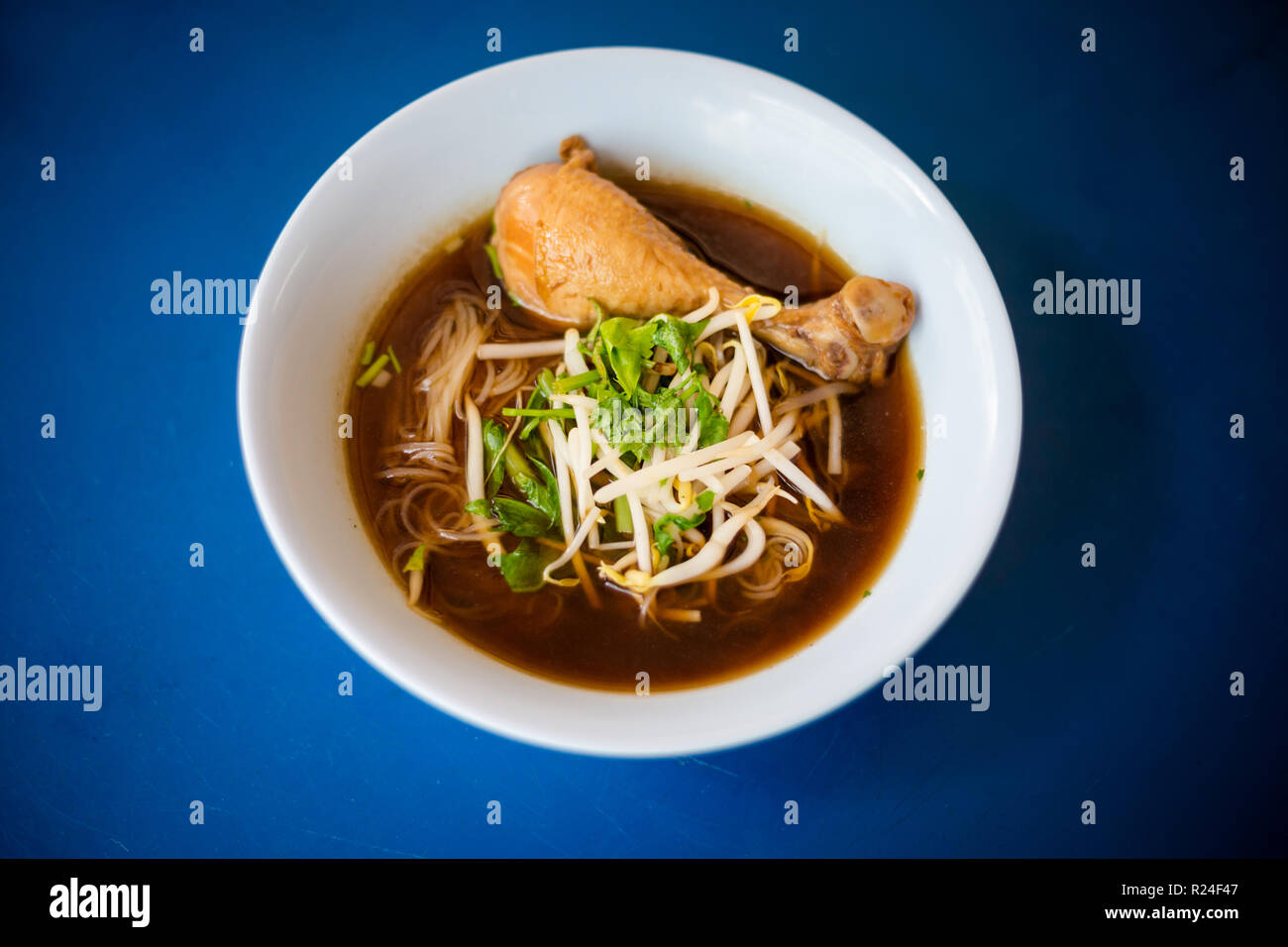 Fresh prepared asian aromatic dark soy sauce broth steamed meat soup
