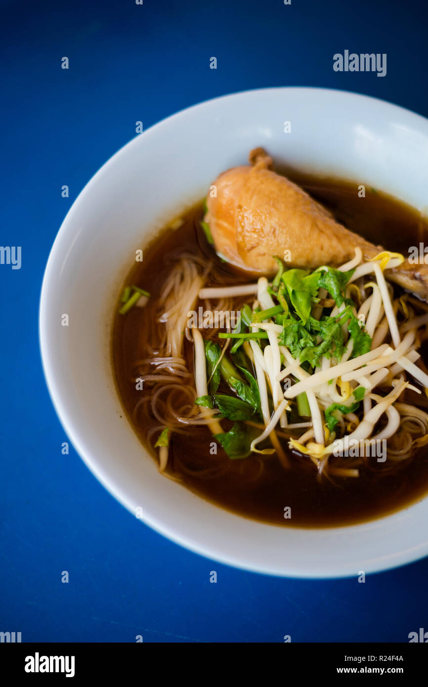 Fresh prepared asian aromatic dark soy sauce broth steamed meat soup