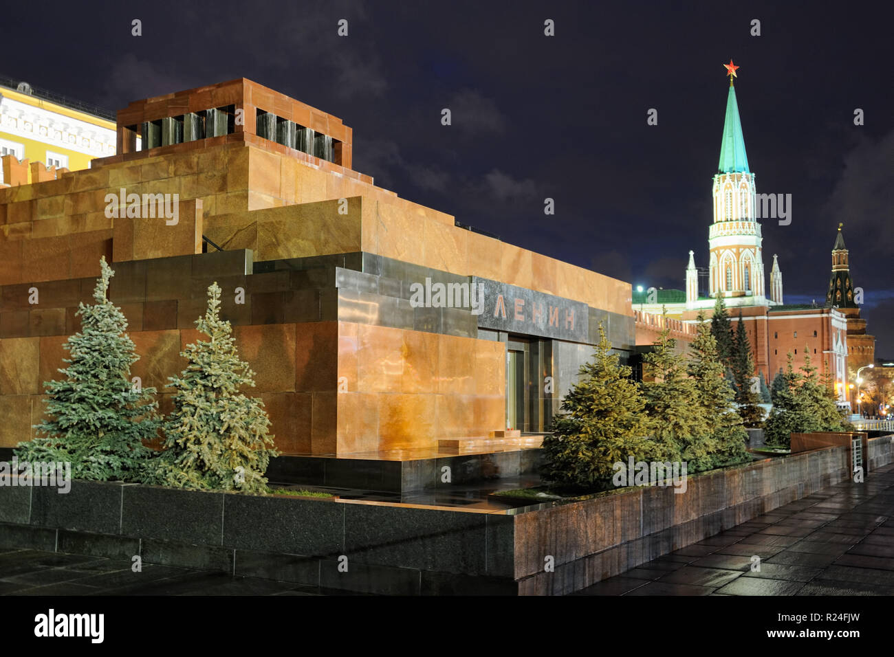 = Lenin's Mausoleum in Red Square at Night =  Night scene of Mausoleum, the memorial burial-vault, where a crystal sarcophagus with the body of Vladim Stock Photo