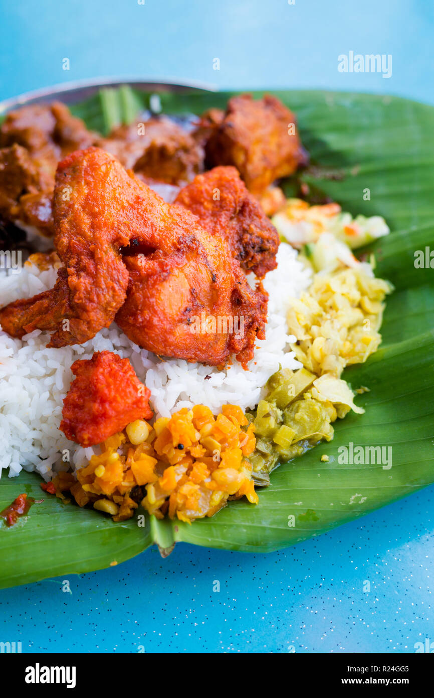 Fresh prepared selection of malaysian local indian food served on