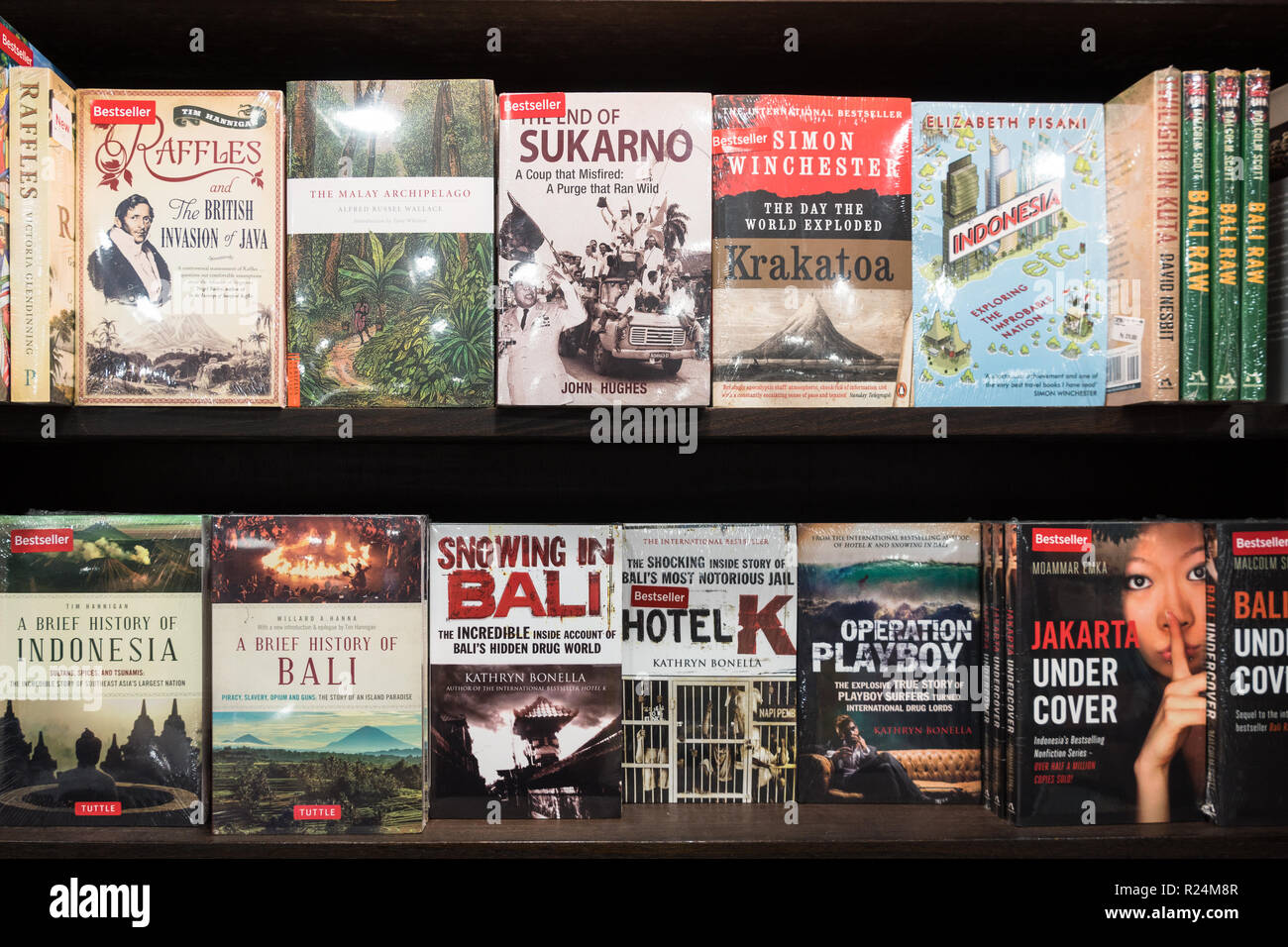 Jakarta, Indonesia - November 13 2018: Various books about Indonesia history, politics and social issues are displayed in a modern bookstore. Stock Photo