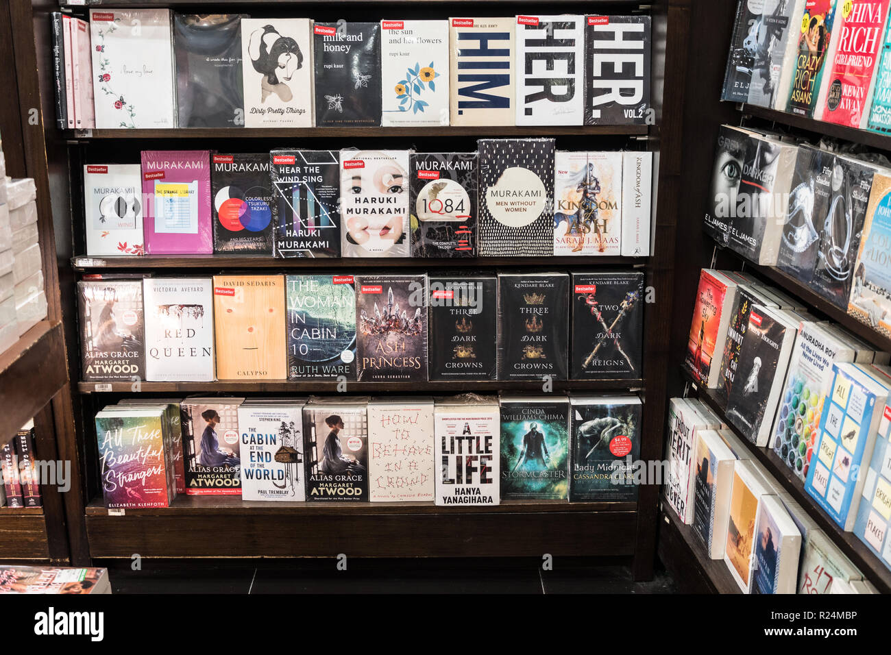 Jakarta, Indonesia - November 13 2018: Various, including from Haruki Murakami, are displayed in a modern bookstore. Stock Photo
