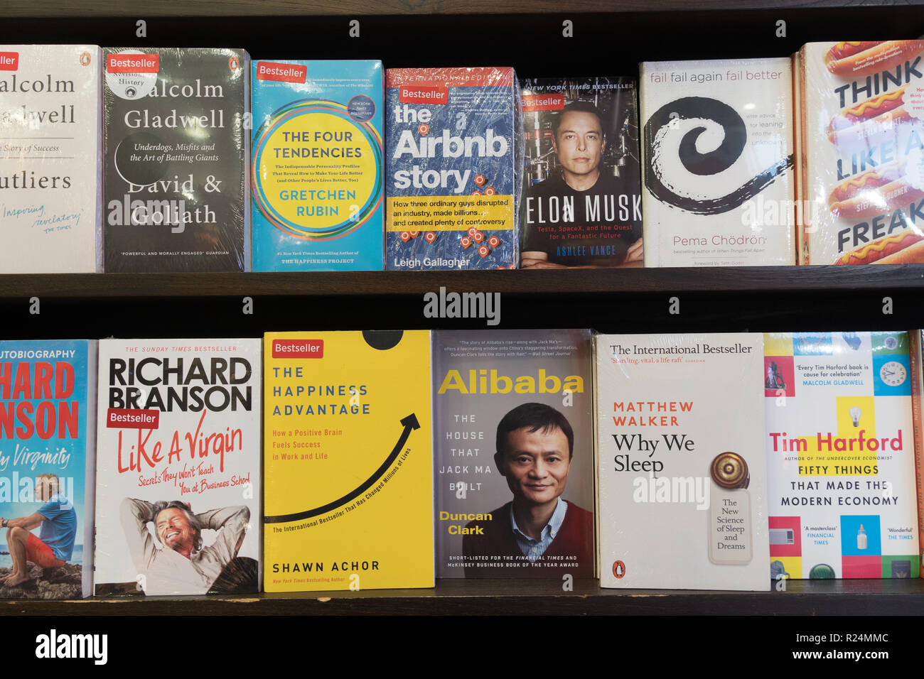 Jakarta, Indonesia - November 13 2018: Various book about business leaders surch as Jack Ma or Elon Musk are displayed in a modern bookstore. Stock Photo