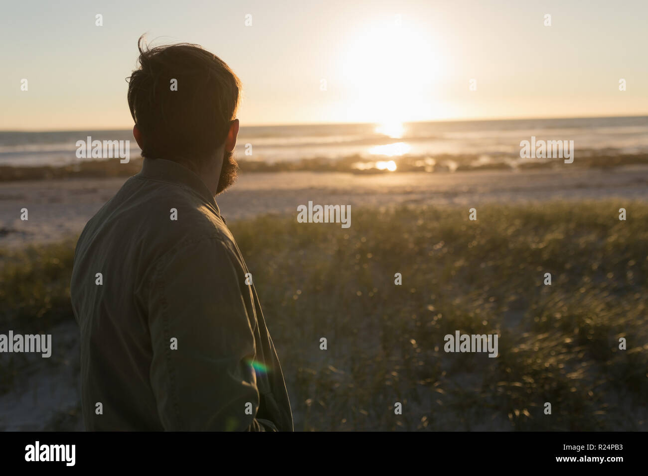 Man beard standing on beach hi-res stock photography and images - Alamy