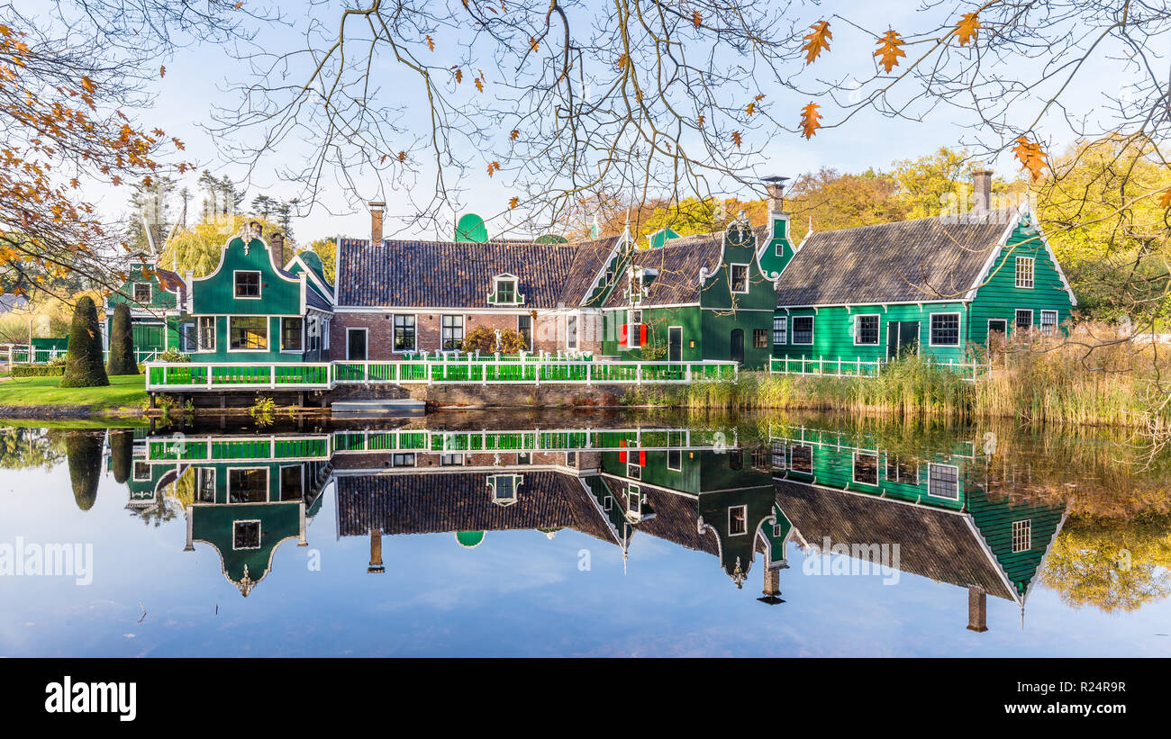 Typical Dutch village with little green gable houses in the open air