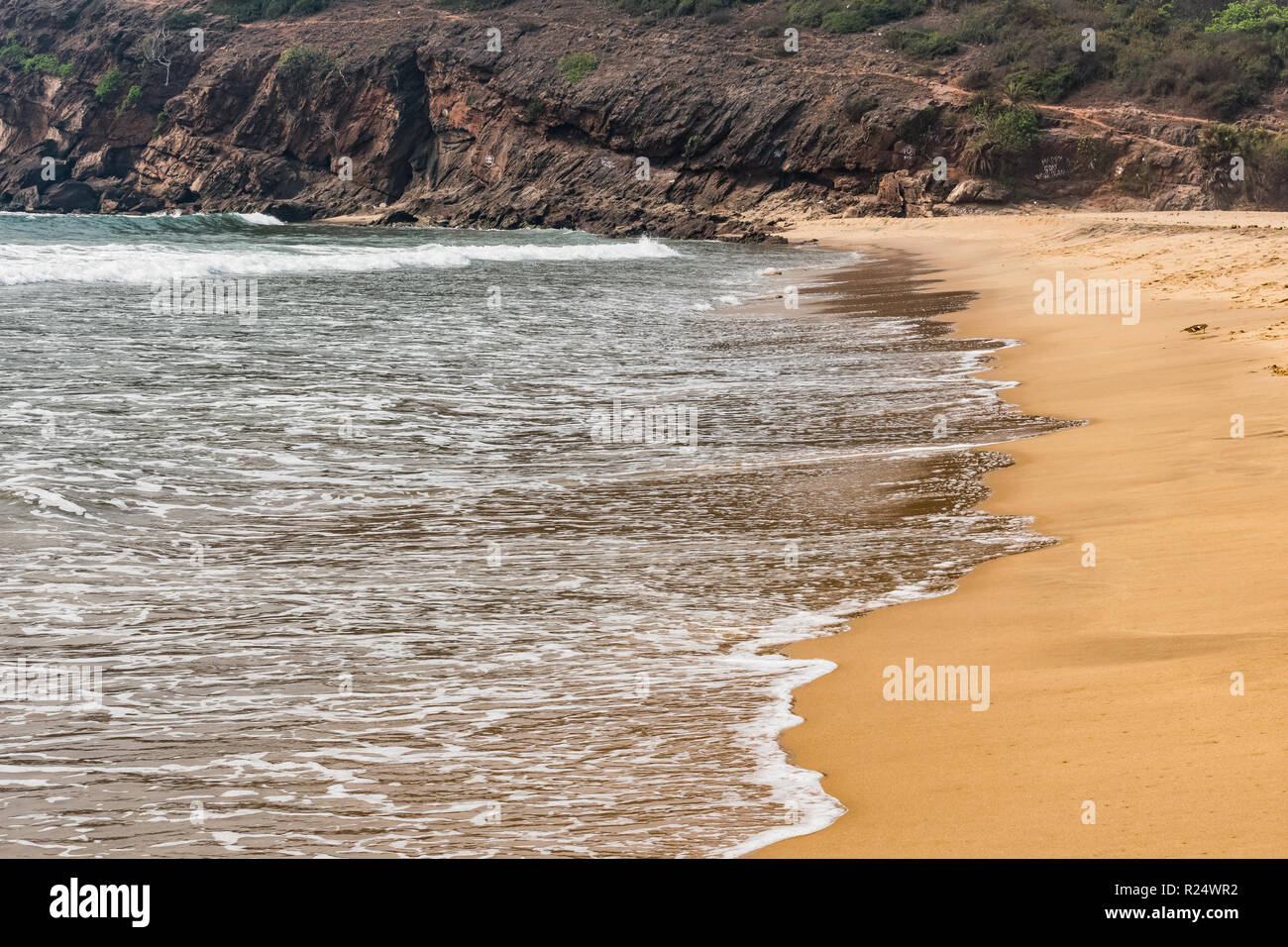 A beautiful pattern of sea water with foam created after collide sea ...