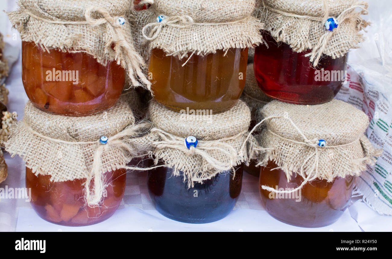 Download Various Colored Honey Jars With Fabric On Lid In Display Stock Photo Alamy Yellowimages Mockups