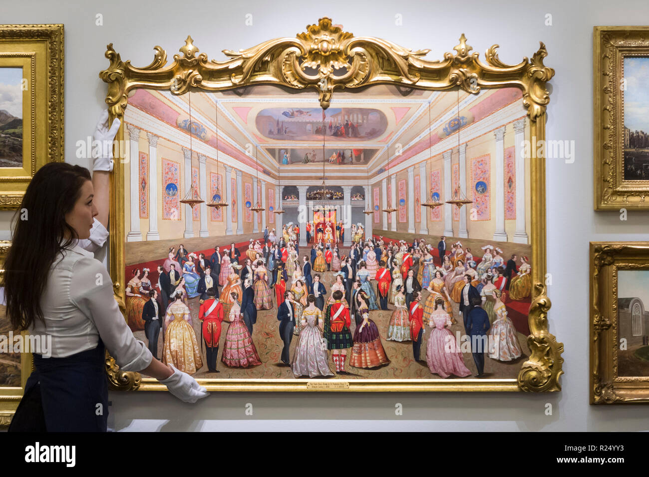 London, UK.  16 November 2018. A technician presents 'St. Patrick's Hall, Dublin Castle', by F.J. Davis (Est. GBP200,000-300,000).  Preview of 'A Living Legacy', the Irish Art Collection of Brian P. Burns, a collection spanning artists from the 18th century to the present day.  Over 100 works will be offered for sale on 21 November at Sotheby's in London.  Credit: Stephen Chung / Alamy Live News Stock Photo