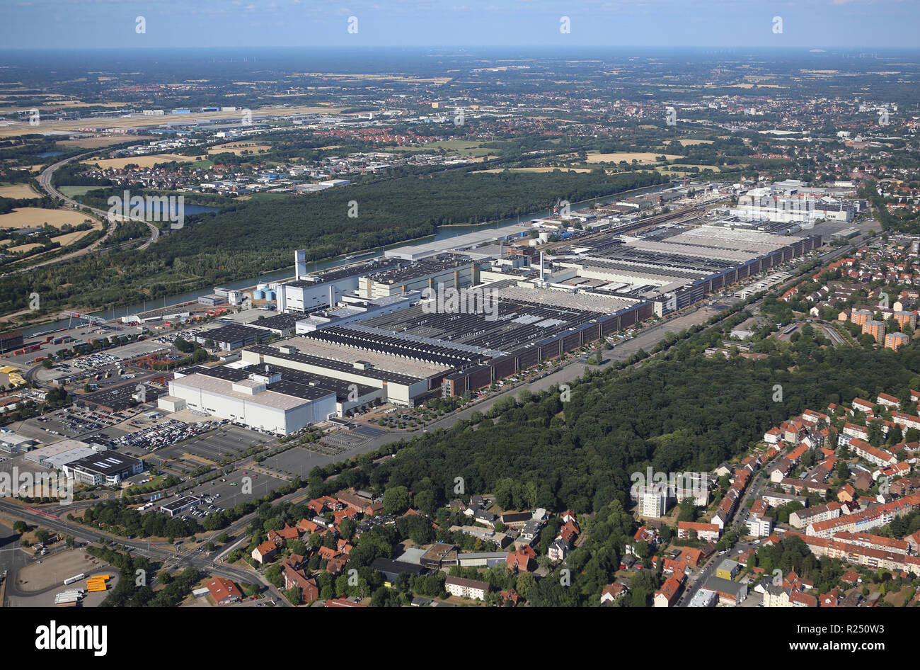 Hannover, Germany. 08th July, 2018. View of the VW commercial vehicle factory. The VW division Volkswagen Commercial Vehicles wants to cut 300 to 400 jobs per year in Hannover by 2028 on the way to the e-auto factory through partial retirement. Credit: Stefan Rampfel/dpa/Alamy Live News Stock Photo