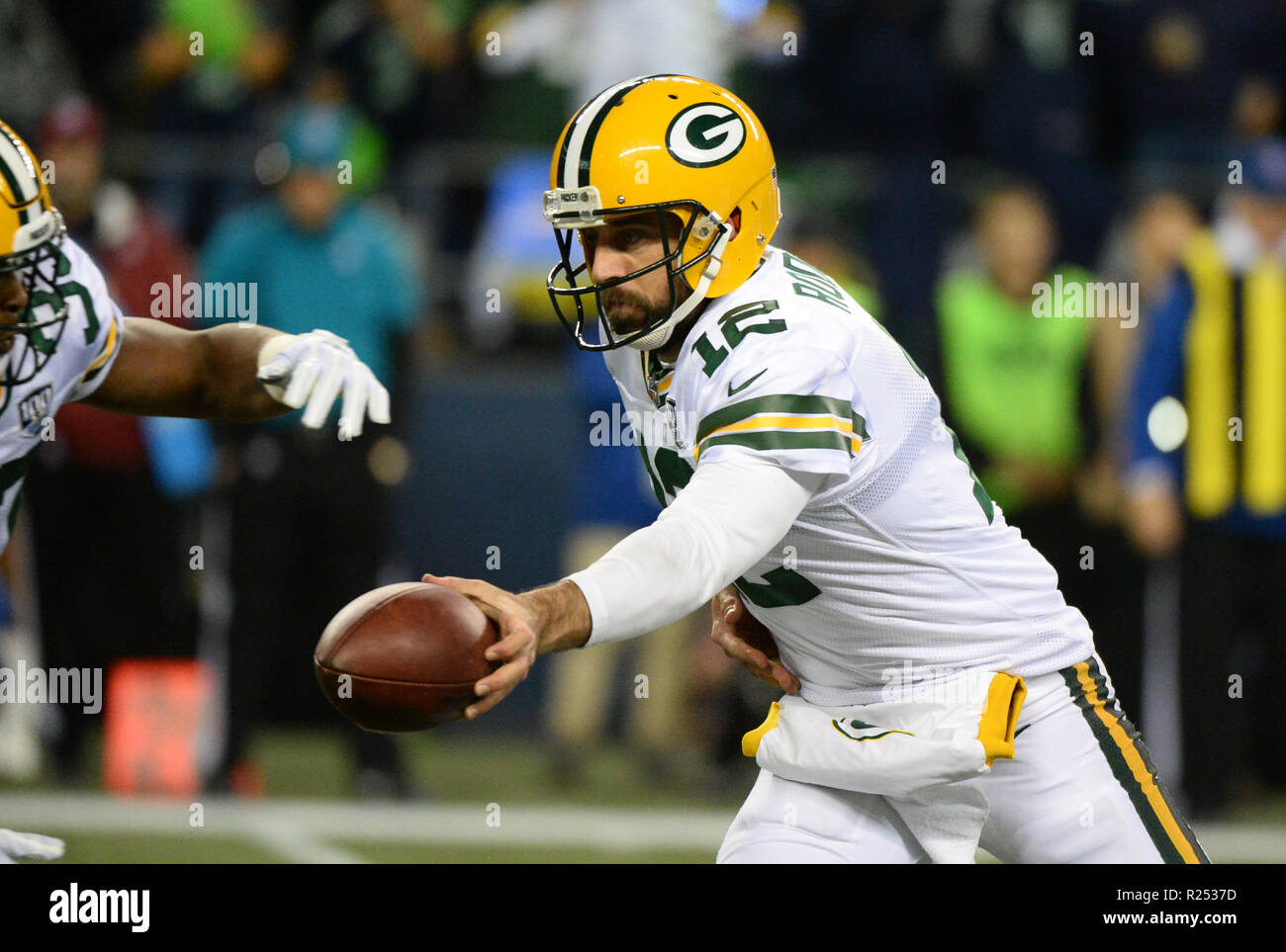 Seattle, WA, USA. 15th Nov, 2018. Green Bay Packers quarterback Aaron  Rodgers (12) in the pocket in his color rush uniform during a game between  the Green Bay Packers and Seattle Seahawks