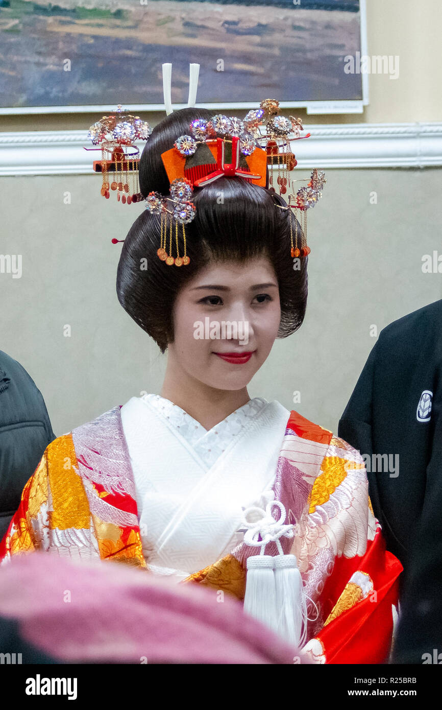 Vladivostok Russia November 17 2018 A Japanese Girl Actress In A National Bride Costume Is Photographed With Visitors During The Fourth Festival Of Japanese Culture In The Far Eastern City Of Primorsky