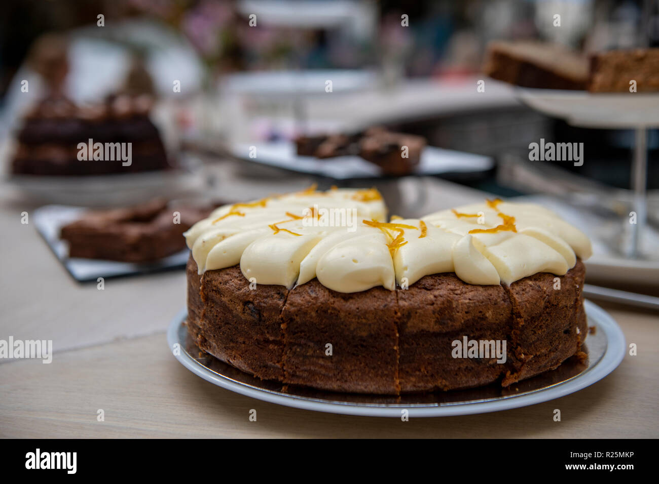 Cakes for sale at a cake stand Stock Photo Alamy