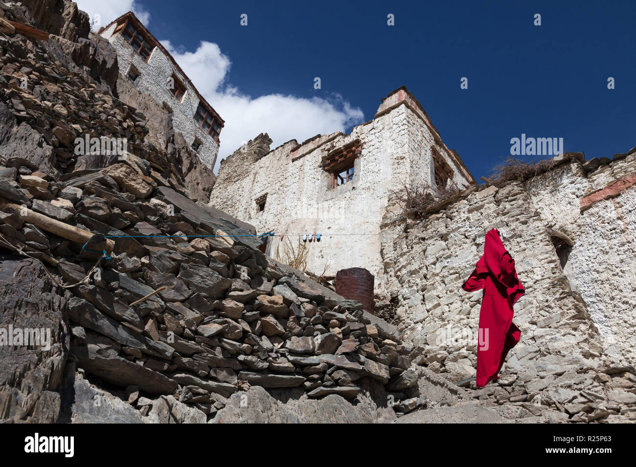 Monk’s robe hanging on clothes line in Karsha Monastery, Zanskar, Jammu and Kashmir, India Stock Photo