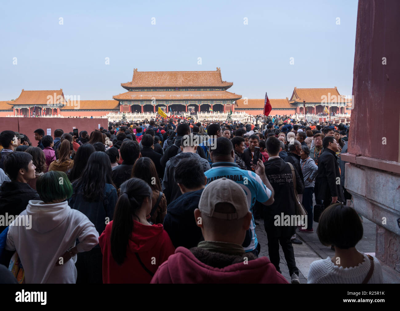 Crowds go through Meridian Gate in Forbidden City Stock Photo