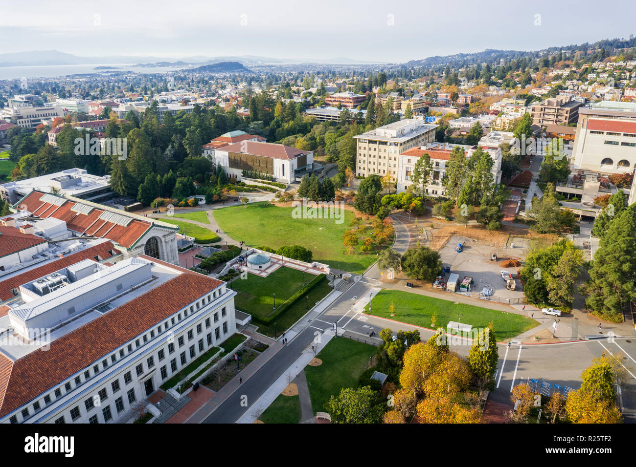 Aerial view of buildings in University of California, Berkeley campus on a sunny autumn day, view towards Richmond and the San Francisco bay shoreline Stock Photo