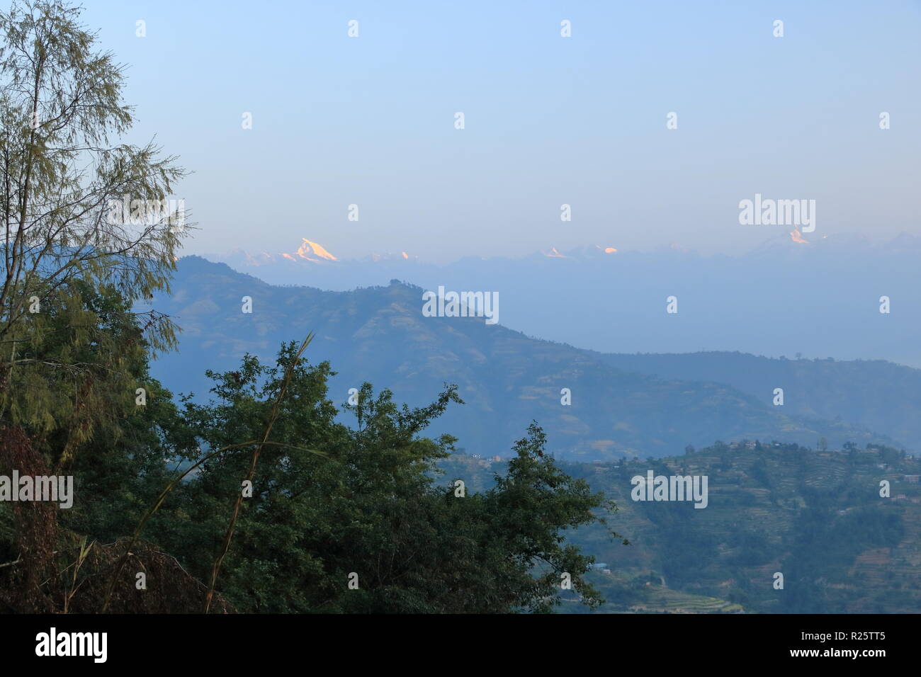 Beautiful first light from sunrise on Himalaya mountain range in Nepal Stock Photo