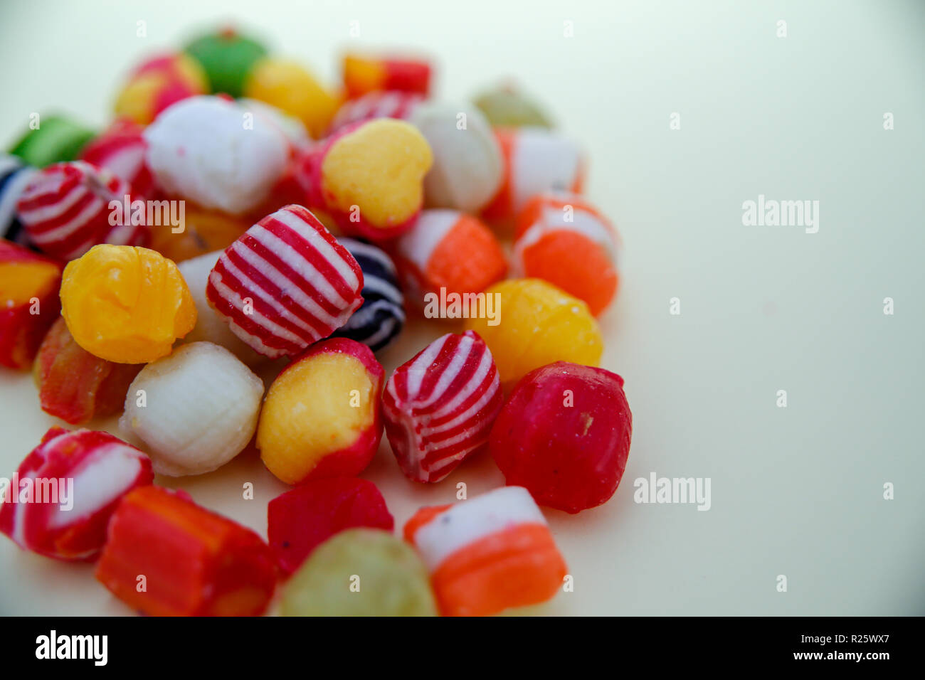 A colourful pile of hard boiled sweets Stock Photo