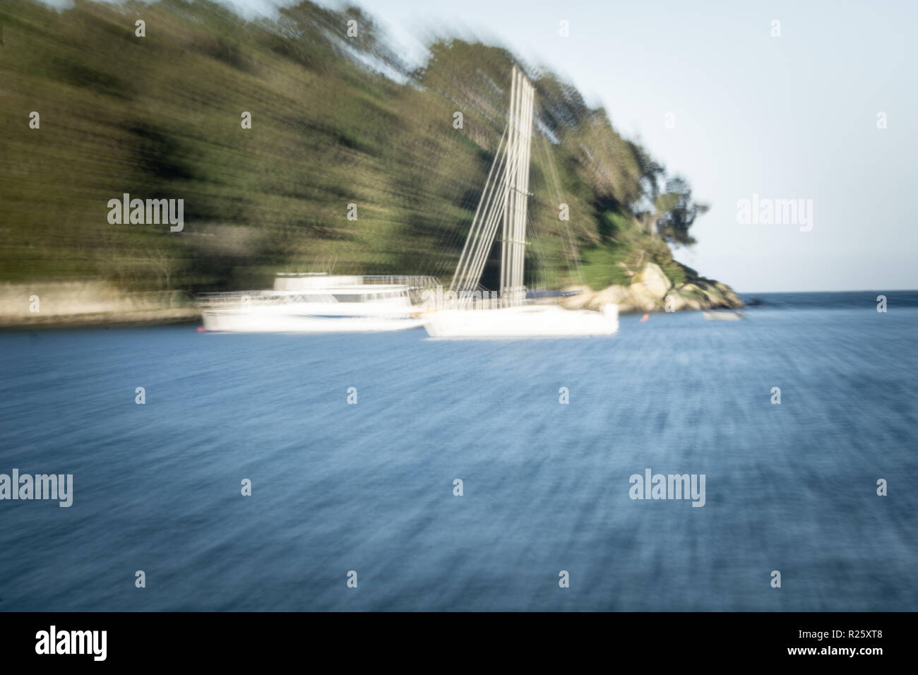 Background image abstract zoom blur at beach with morred yacht and boat Stock Photo