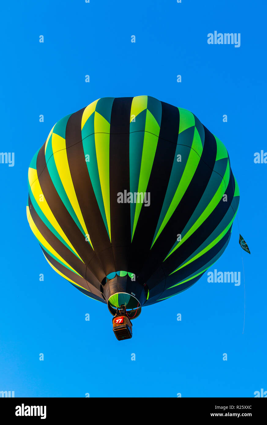 Hot air balloon in front of blue sky, Quebec, Canada Stock Photo - Alamy