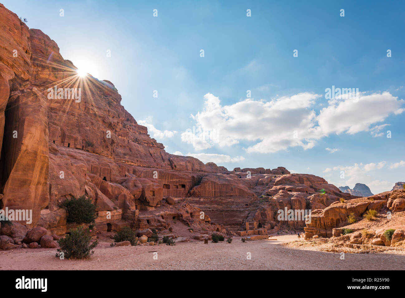 Houses carved in sandstone rocks, Nabataean town of Petra, near Wadi Musa, Jordan Stock Photo