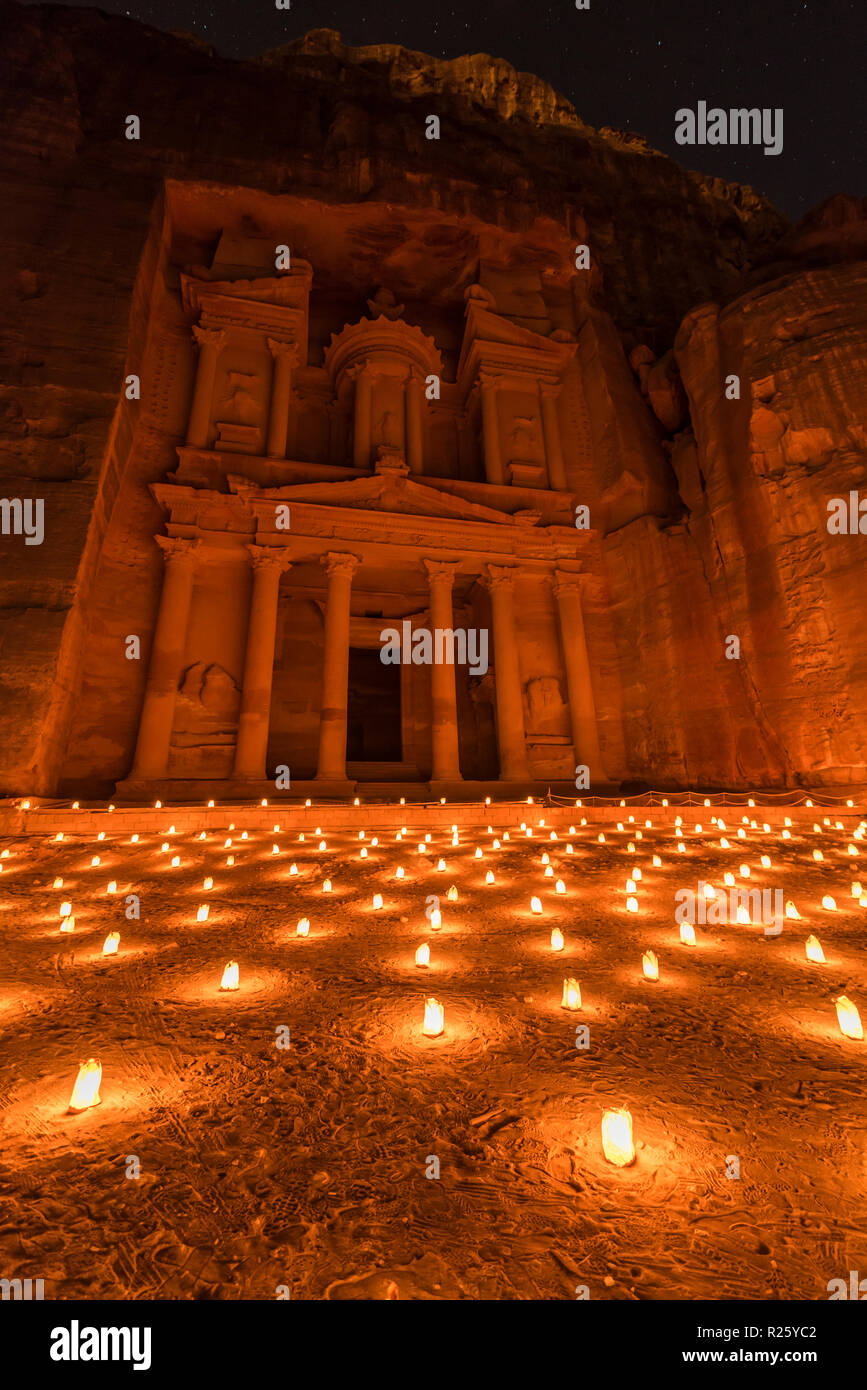 Candles in front of the Pharaoh's treasure house, struck in rock, at night, facade of the treasure house Al-Khazneh, Khazne Stock Photo