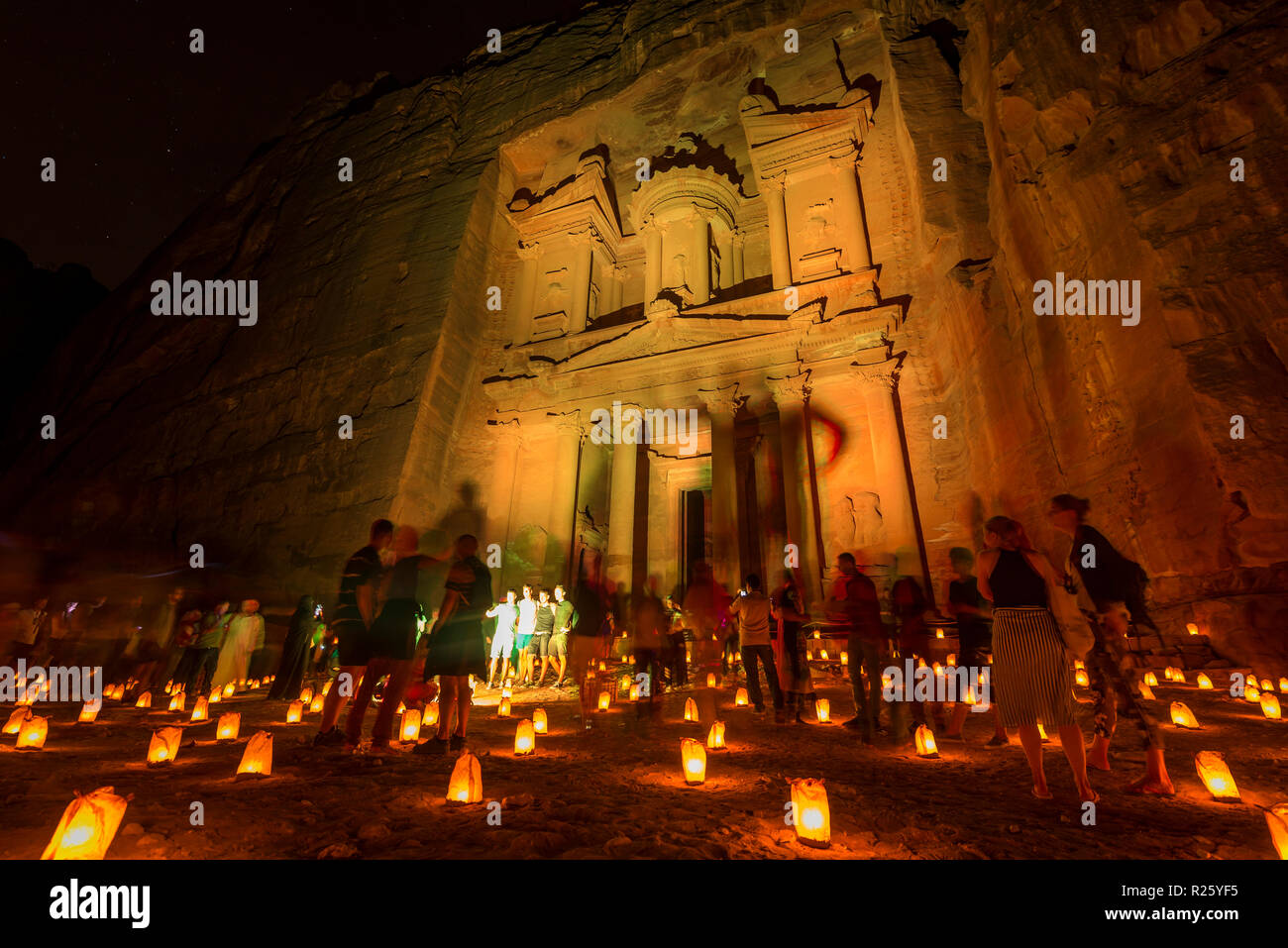 Candles in front of the Pharaoh's treasure house at night, illuminated facade of the treasure house Al-Khazneh, Khazne Faraun, Stock Photo