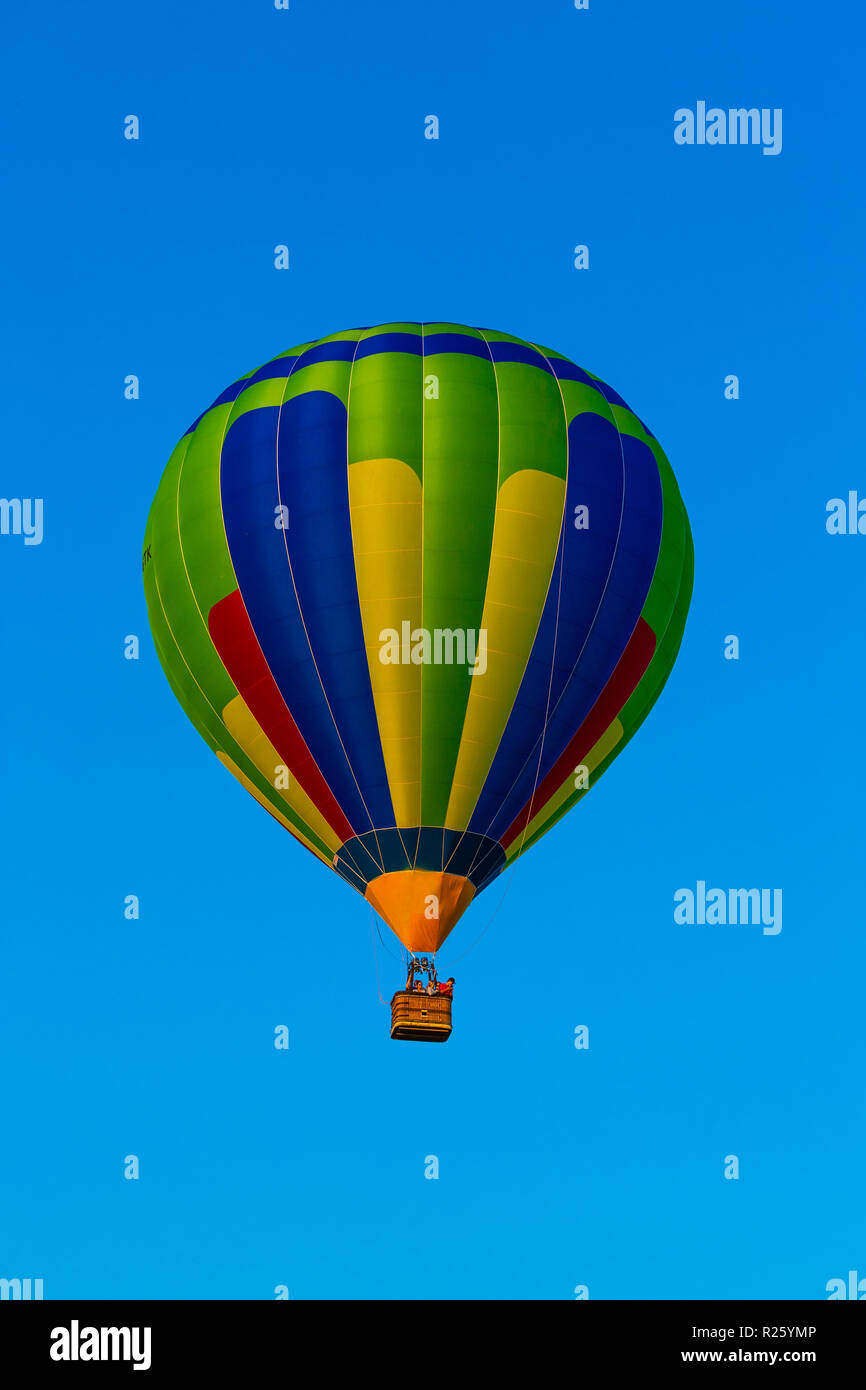 Hot air balloon in front of blue sky, Quebec, Canada Stock Photo