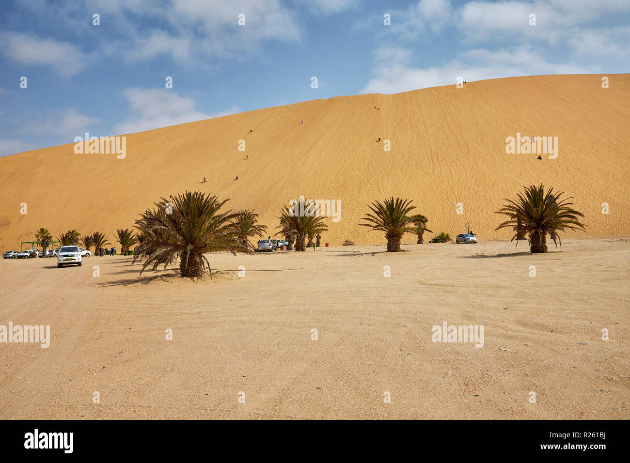 People climbing Dune 7 in Walvis Bay in Namibia, Africa Stock Photo Alamy