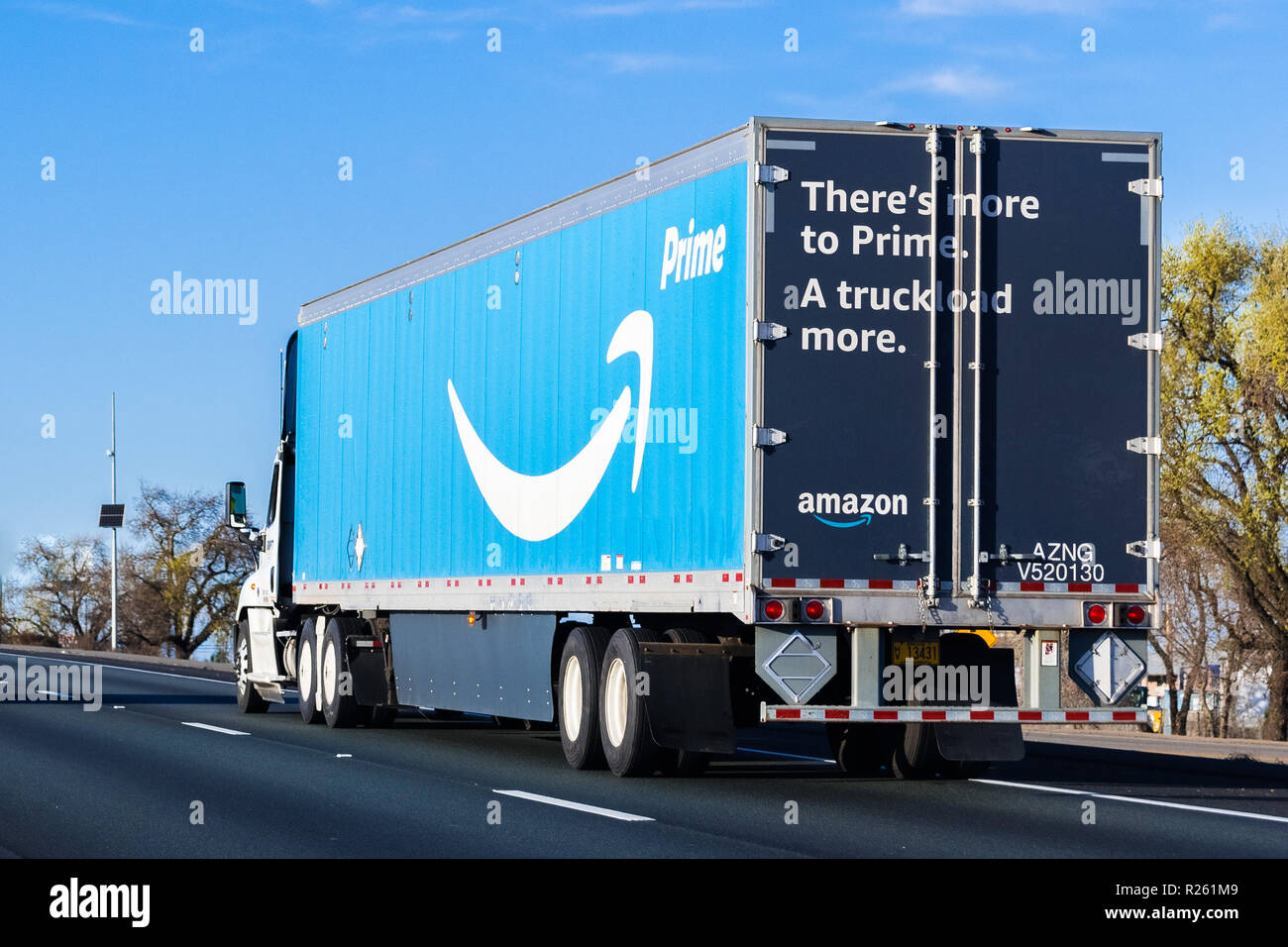 March 22, 2018 Stockton / CA / USA - Amazon truck driving on the highway, the large Prime logo printed on the side Stock Photo