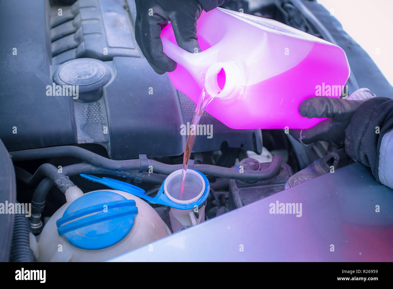 Filling a Windshield Wiper Fluid Reservoir Stock Photo Alamy