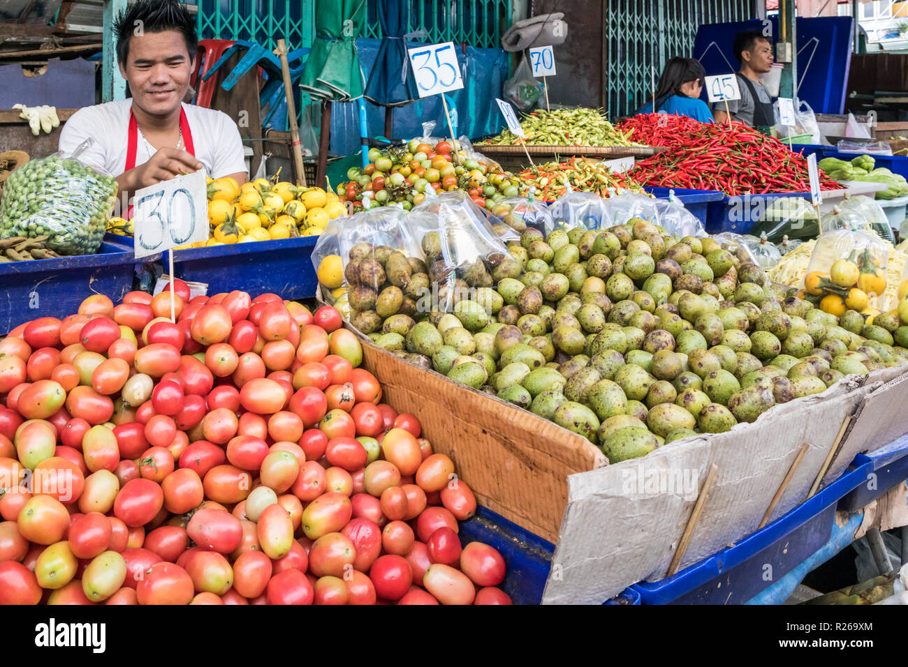 Bangkok, Thailand - 4th October 2018: Vegetable stall on Khlong Toei market. The wet market is the largest in the city Stock Photo