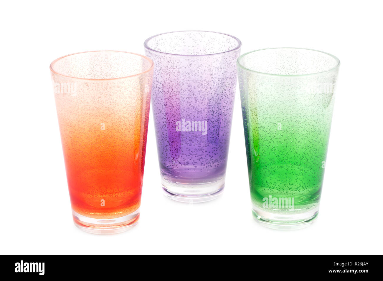Colorful plastic glasses isolated on white background. Stock Photo