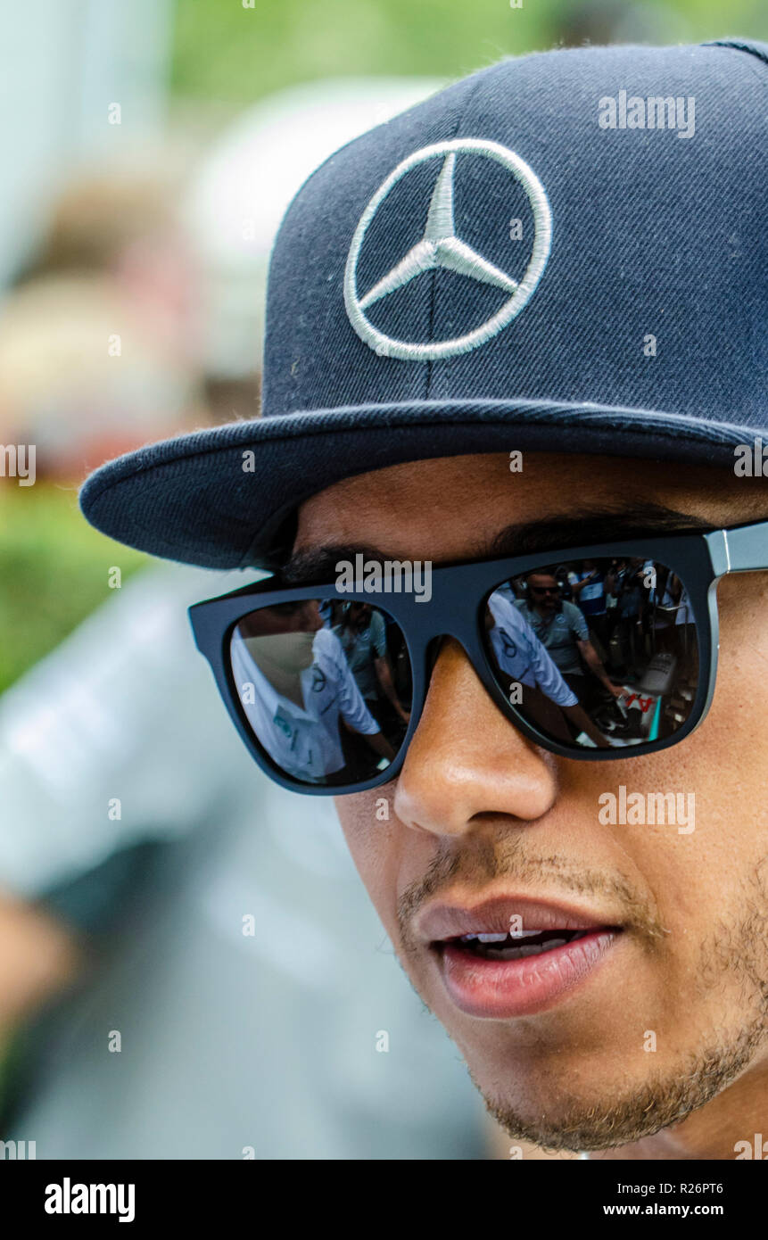 Lewis Hamilton, Mercedes Formula 1 Grand Prix racing driver. F1 World  Champion motor racing driver in Mercedes cap, hat. Sunglasses reflection  Stock Photo - Alamy