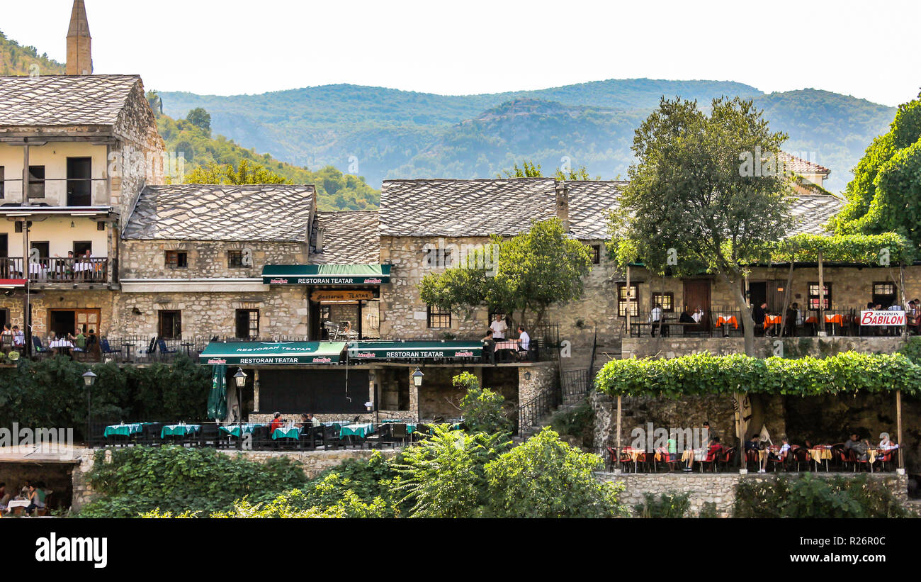 August 2013, Mostar Restaurant Teatar and Babilon on the bank of the River Neretva. Stock Photo
