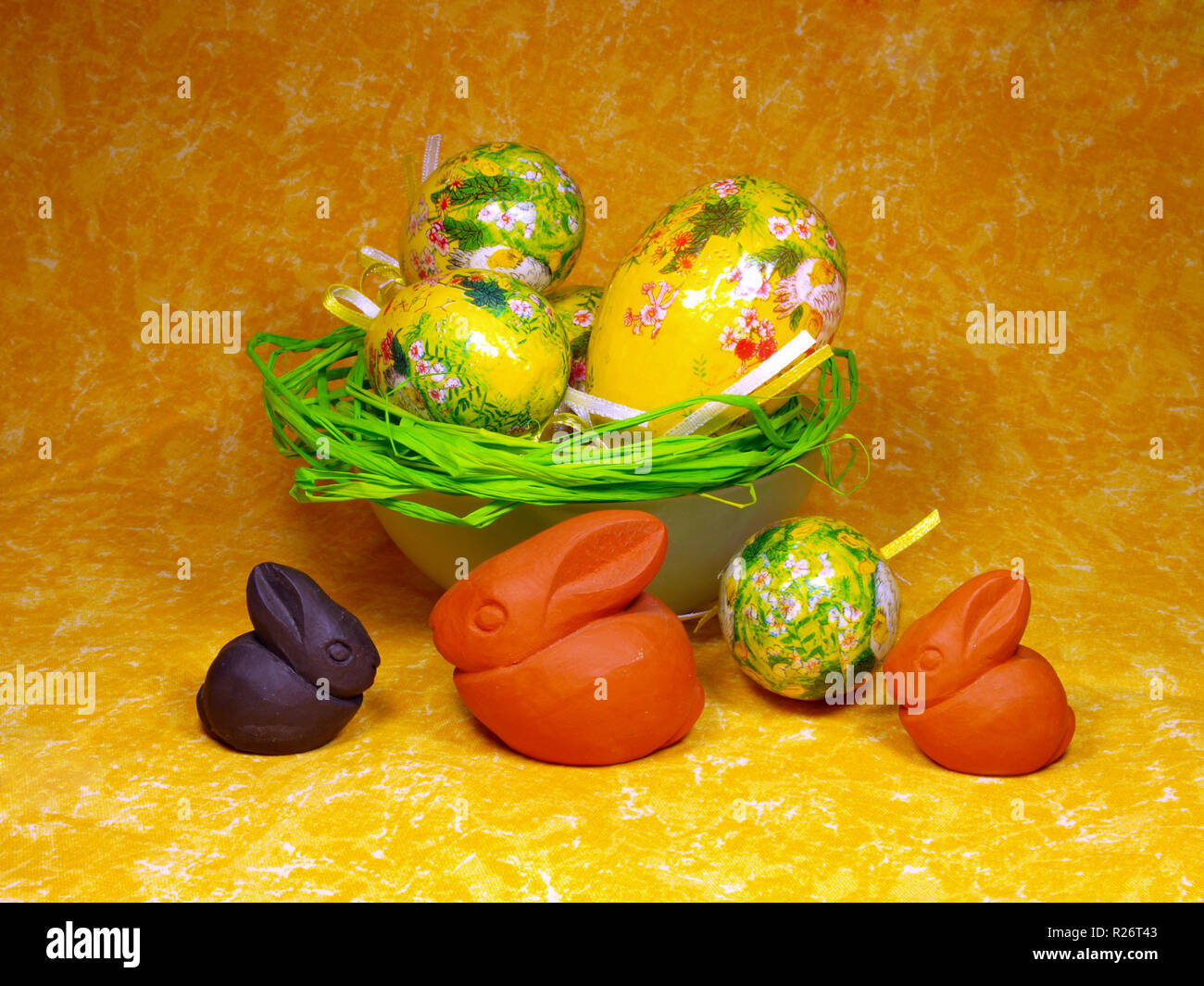 Easter decoration with eggs and ceramic bunnies Stock Photo - Alamy