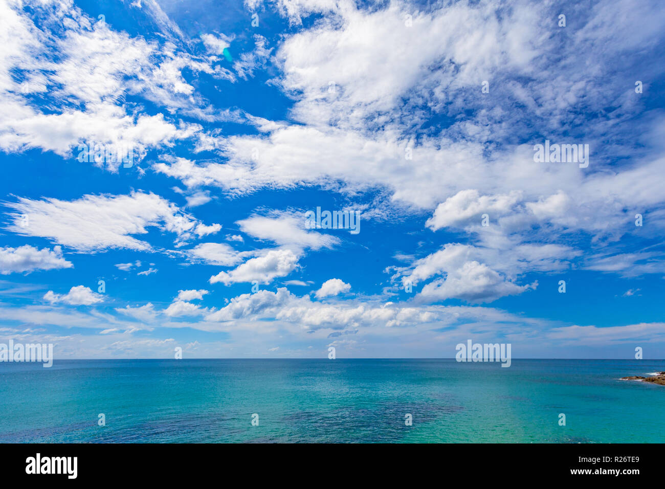 white cloud in blue sky above the ocean Stock Photo - Alamy