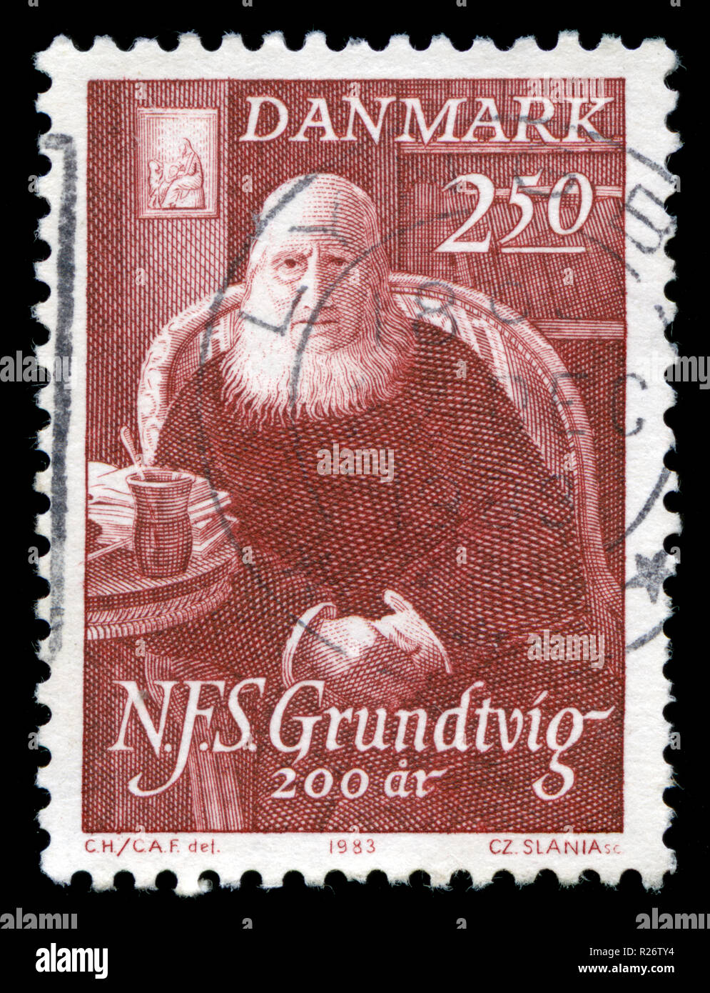Postmarked stamp from Denmark in the  Grundtvig, N.F.S. series issued in 1983 Stock Photo