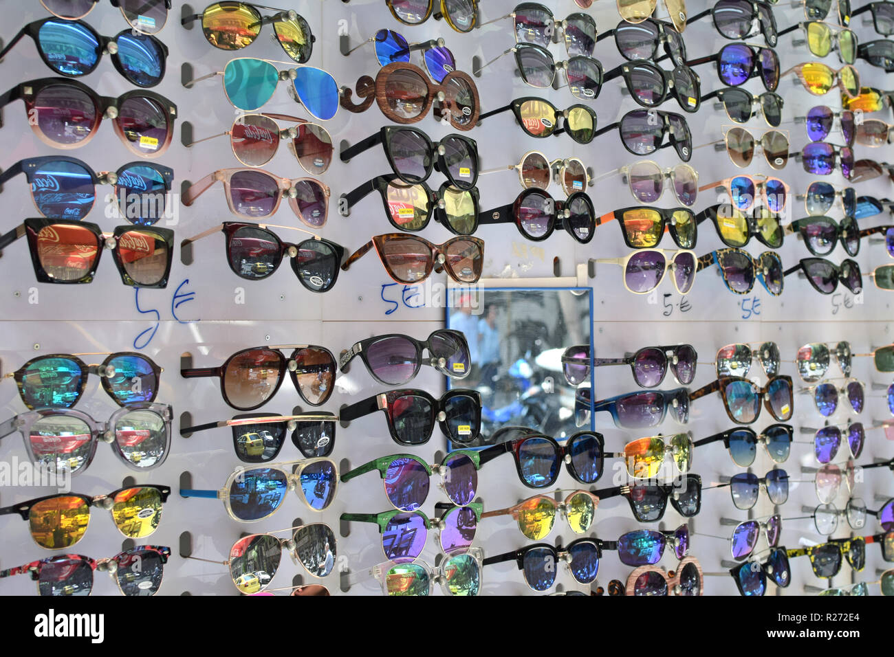 ATHENS, GREECE - JULY 19, 2018: Cheap sunglasses on display at street market. Stock Photo