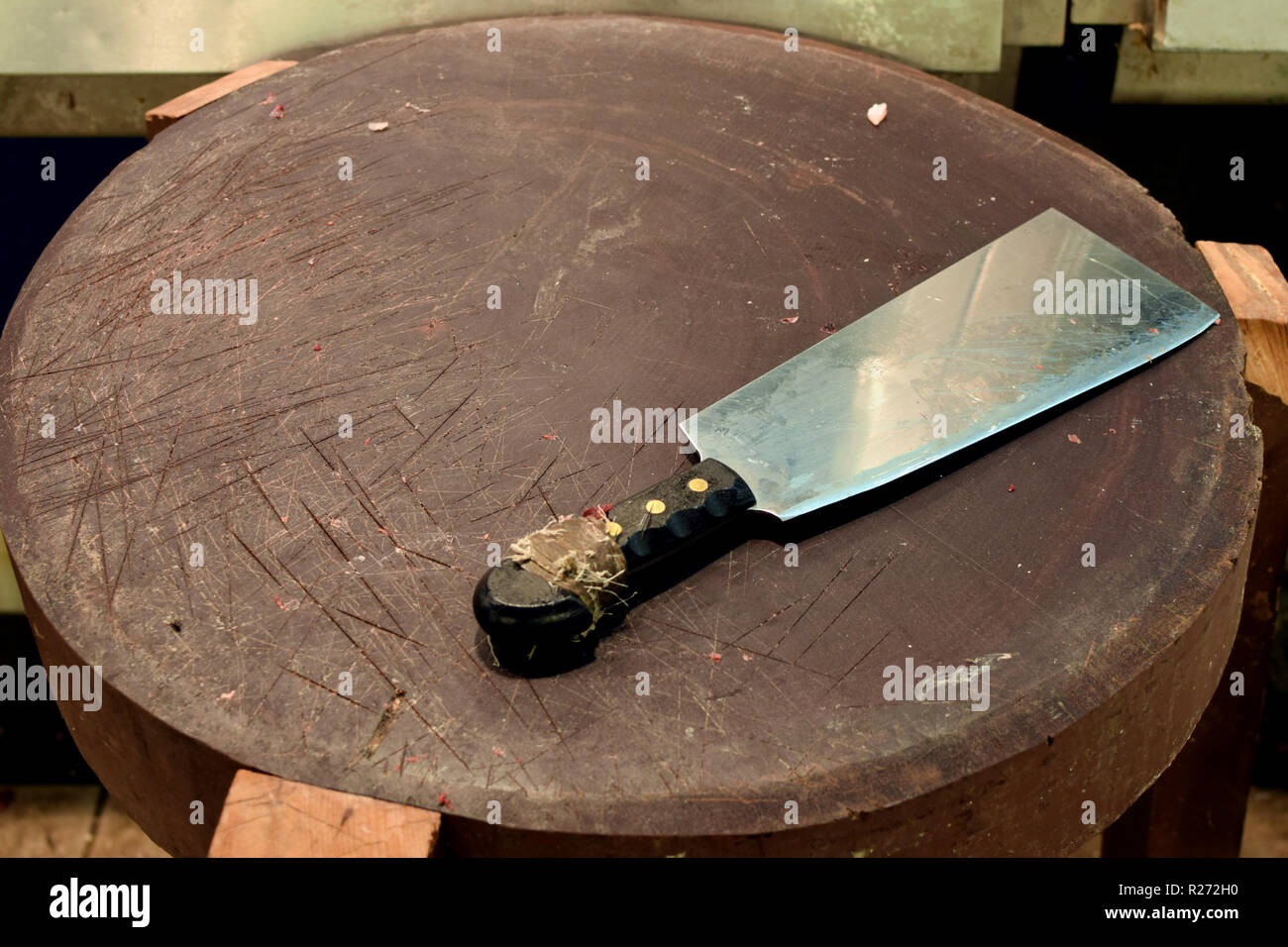 Bloody meat cleaver on wooden butchers cutting board Stock Photo Alamy