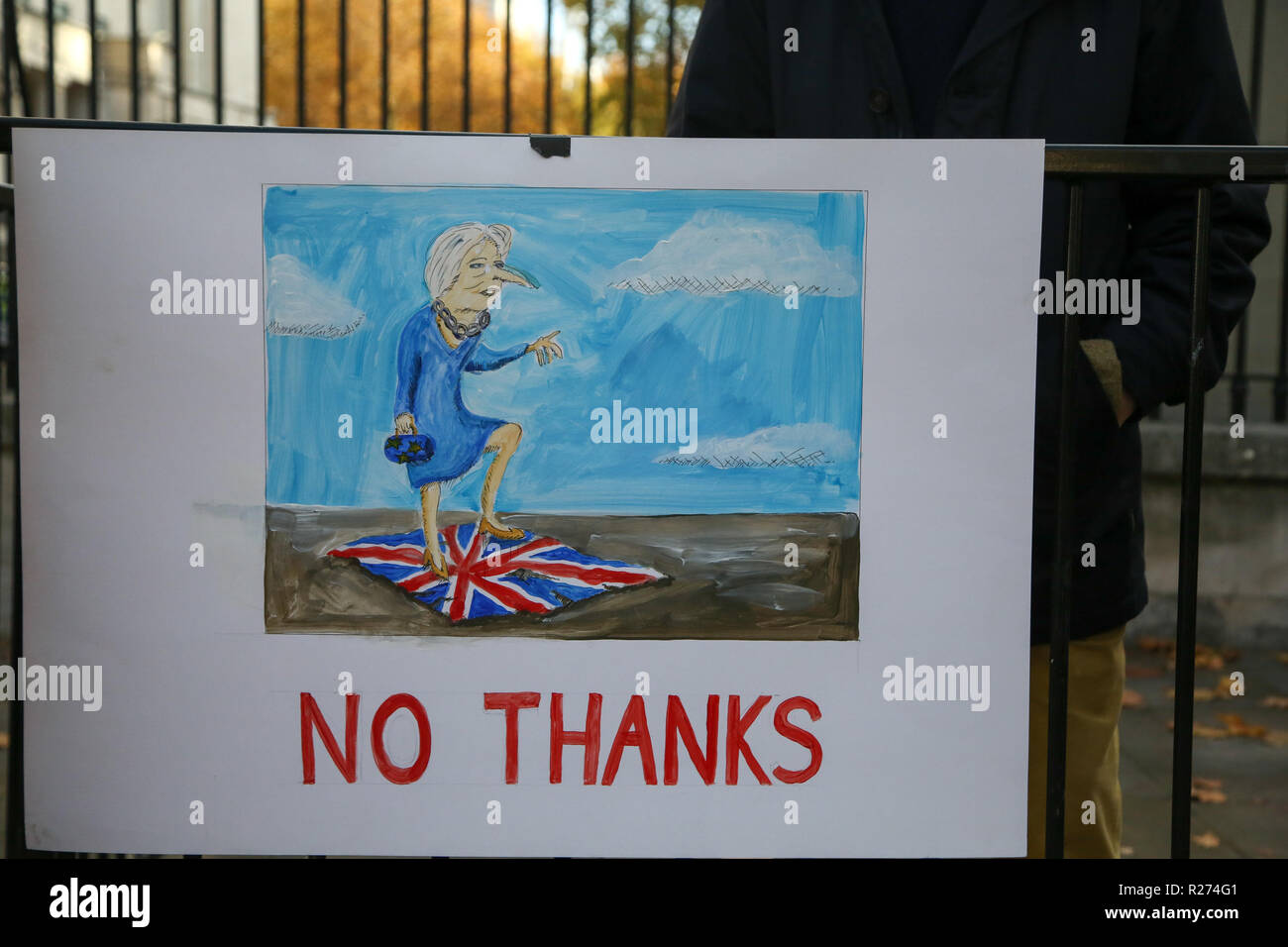 A colourful painting seen hanging on the fence during the protest at Downing Street. A few Brexit supporters gathered in front of Downing Street together with their Pro Brexit placards to show their support to the Conservative government led by Theresa May for the negotiations carried out between the UK and the European Union over Brexit terms. Stock Photo