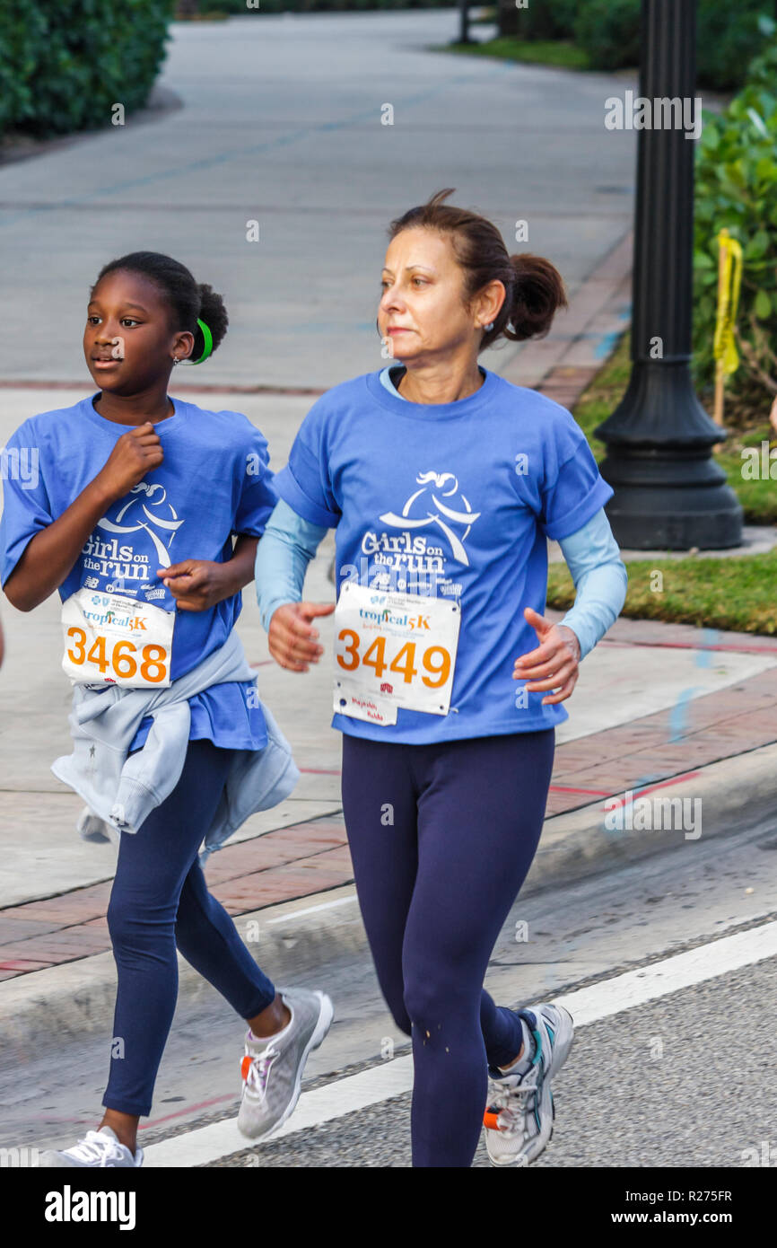Miami Beach Florida,Blue Cross & Blue Shield Tropical 5K Run,race,runner,endurance,sports,fitness,Black woman female women,girl girls,youngster,kids c Stock Photo