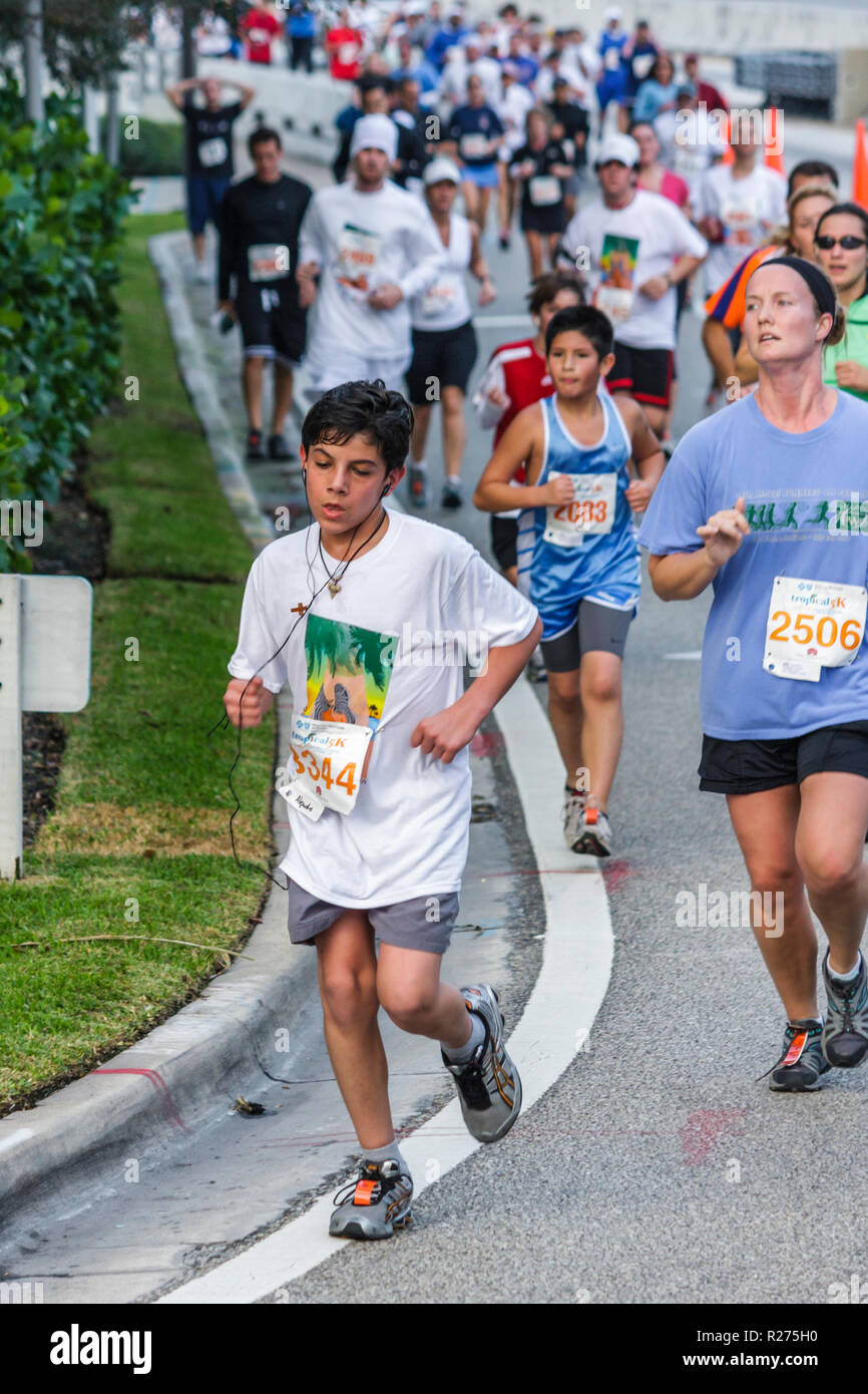 Miami Beach Florida,Blue Cross & Blue Shield Tropical 5K Run,race,runner,endurance,sports,fitness,boy boys,male kid kids child children youngster,woma Stock Photo